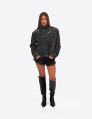 Chaqueta biker oversize de piel negra 100% con cierre asimétrico y cuello alto