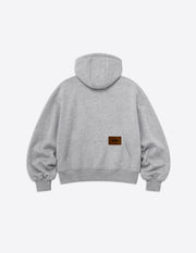 Sudadera oversize unisex gris de WAENN vista desde atrás, con capucha y bolsillo delantero