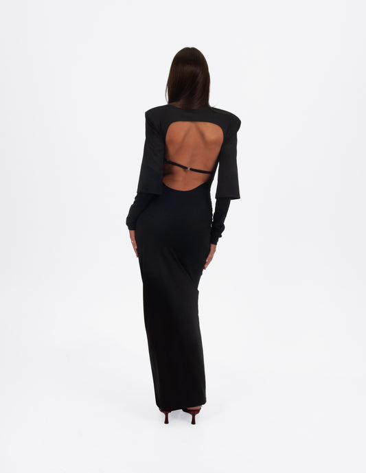 Vestido largo negro ajustado de WAENN con espalda descubierta y hombros estructurados.