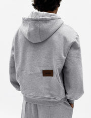 The Signature Hoodie, sudadera oversize unisex gris de WAENN, vista de espalda