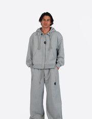The Signature Hoodie, sudadera oversize unisex gris de WAENN, vista de frente